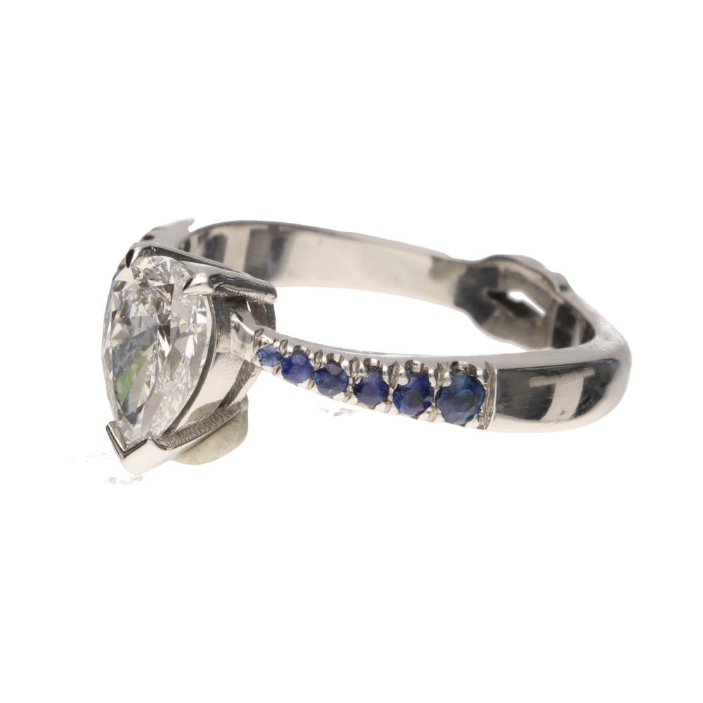 Pre- Owned 18ct White Gold Pear Cut 0.84ct Diamond & Sapphire Set Ring