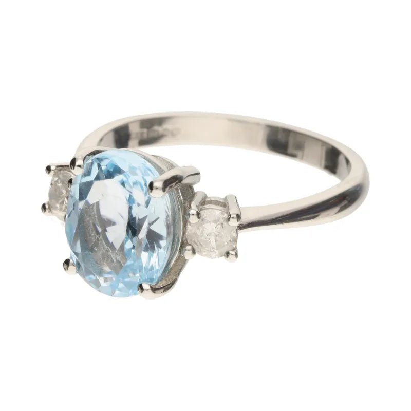 Platinum Triple Stone Oval Cut Blue Topaz & Diamond Ring258349