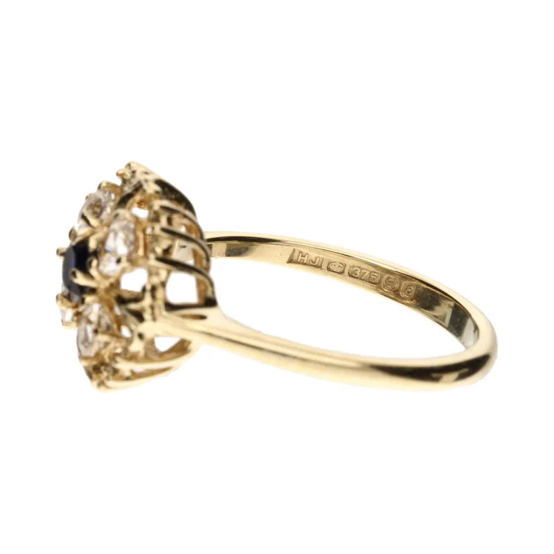 Pre-Owned 9ct Yellow Gold Blue/Clear CZ Openset Ring