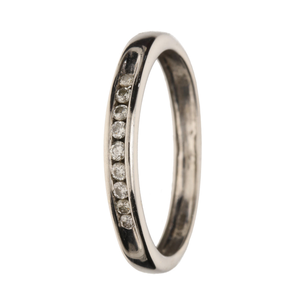 gold ringwith diamonds on a white background
