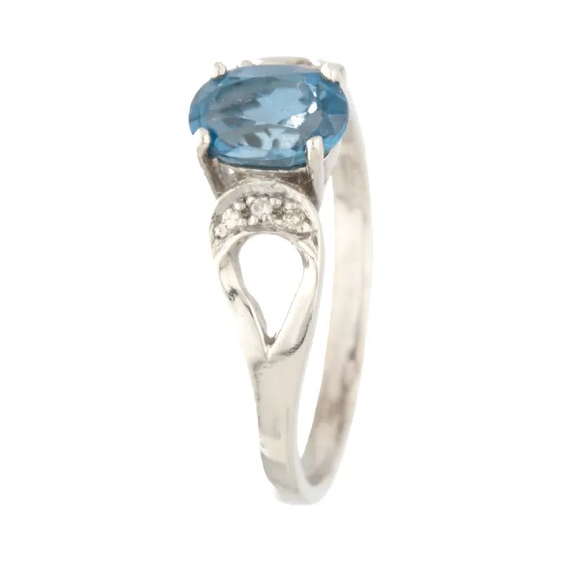 Opulent Pre - Owned 9ct White Gold Oval London Blue Topaz & Diamond Ring2026W36-8-41