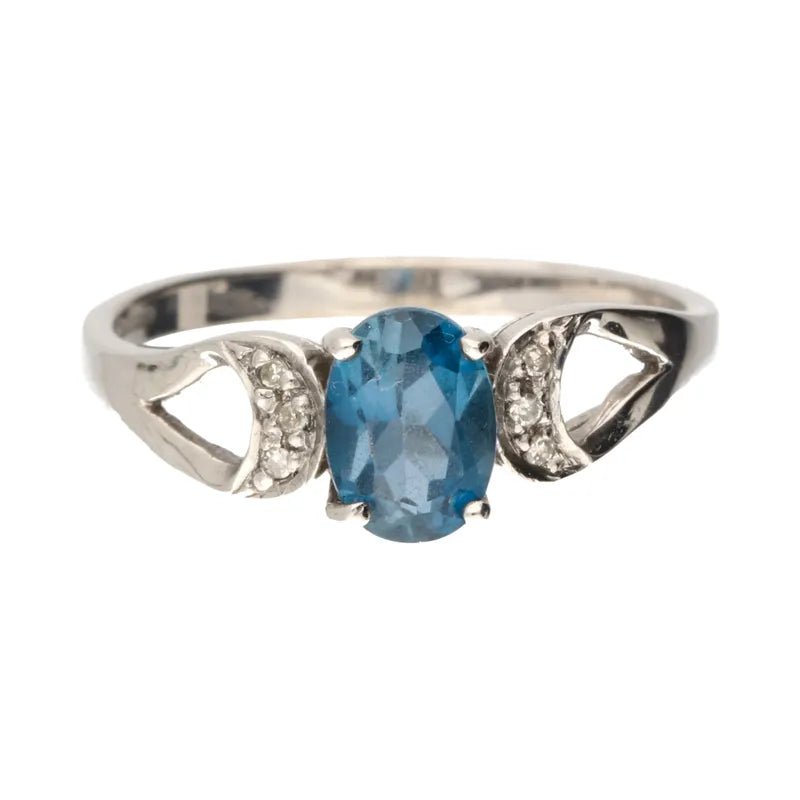 Opulent Pre - Owned 9ct White Gold Oval London Blue Topaz & Diamond Ring2026W36-8-41