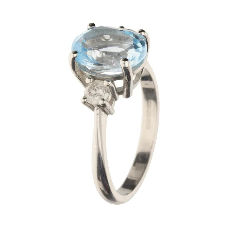 Platinum Triple Stone Oval Cut Blue Topaz & Diamond Ring258349