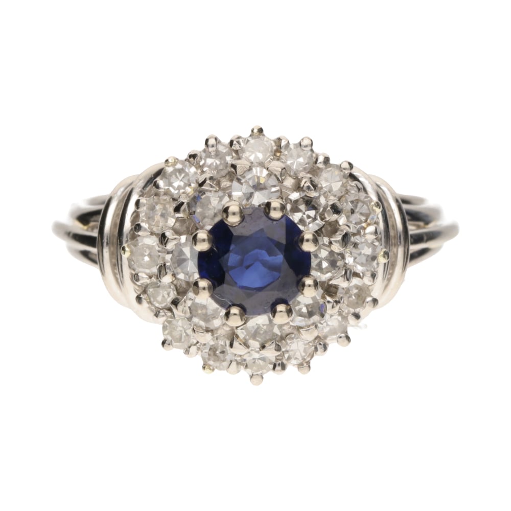 Pre - Owned 18ct White Gold Sapphire and Diamond Cluster Ring.