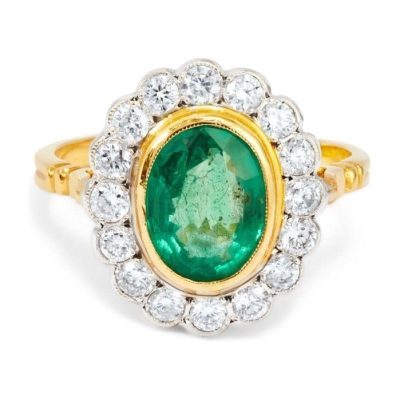 Yellow Gold Oval Emerald with Diamond Cluster