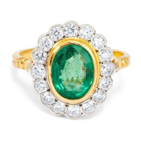 Yellow Gold Oval Emerald with Diamond Cluster