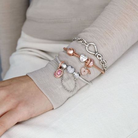 590727CZ Pandora Moments pave set heart clasp bracelet layered with other Pandora bracelets
