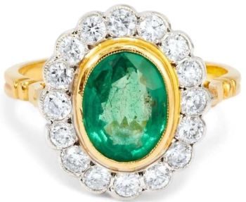 Emerald oval cut diamond cluster ring