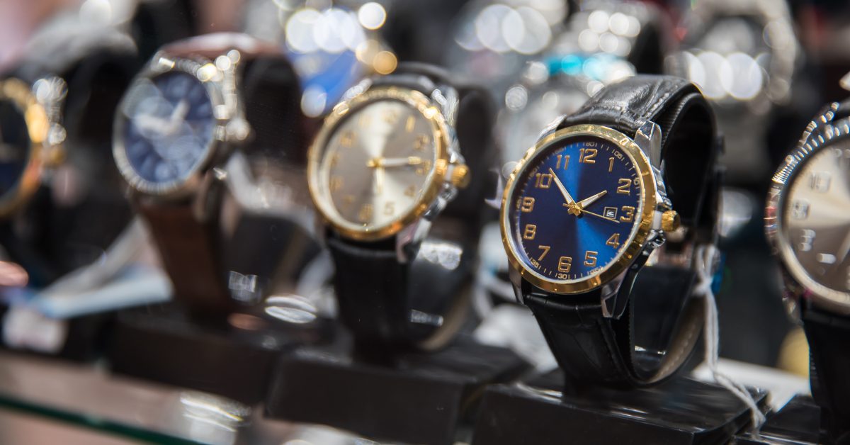 Ultimate watch buyers guide header/introduction photo with row of watches in a shop window