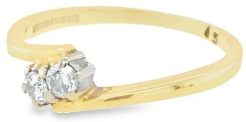 Double stone diamond twist 18 ct yellow gold ring