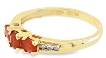 Fire opal trilogy channel diamond set shoulders 9ct yellow gold ring