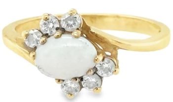 Opal cubic zirconia 9ct yellow gold crossover ring