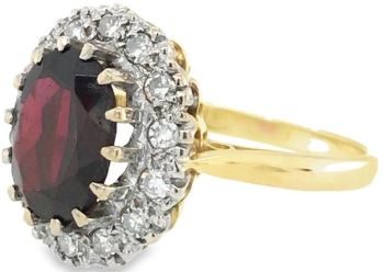 Red oval garnet diamond cluster ring 18ct yellow gold