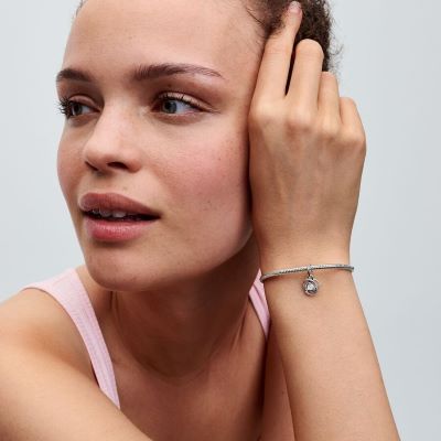 Pandora June Birthstone Eternity Circle Dangle charm layered with Pandora Moments Snake bracelet